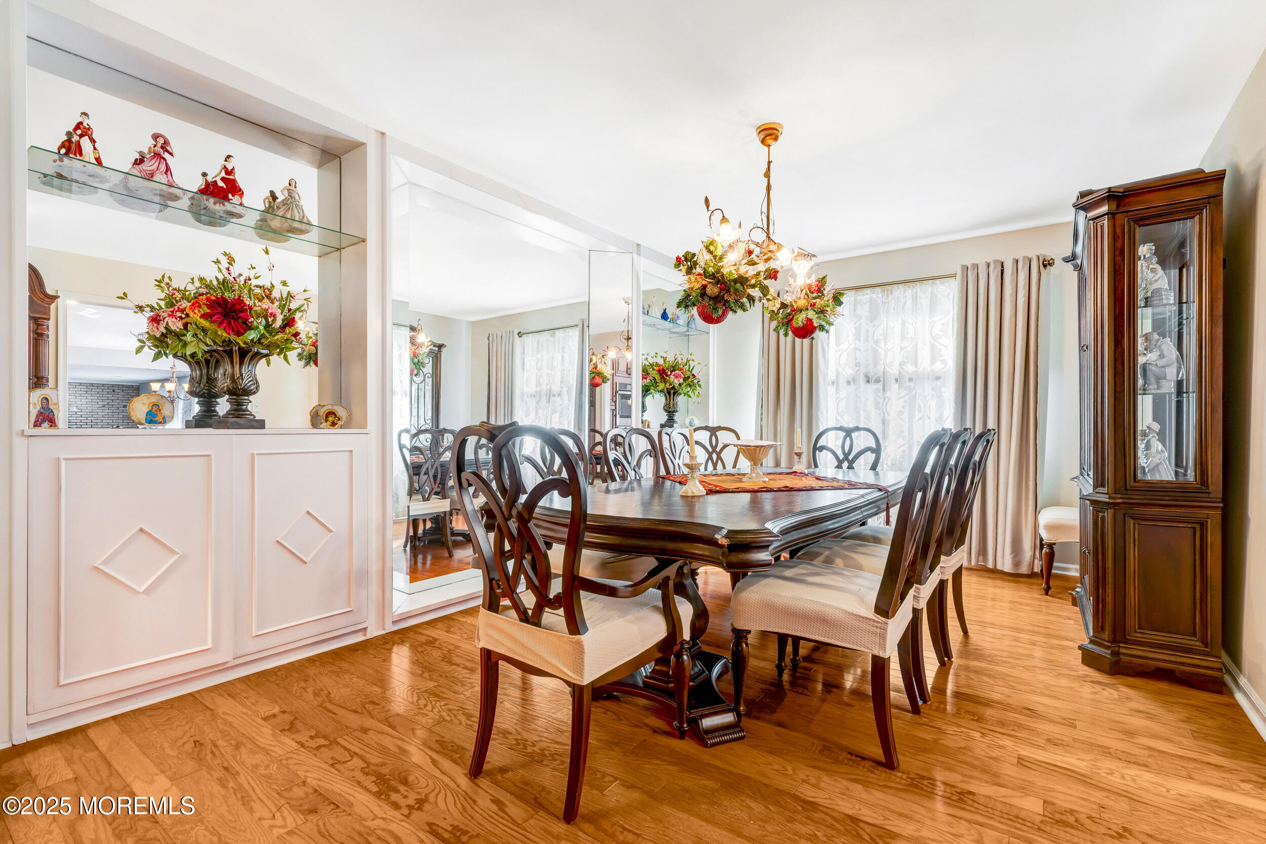 7 Oak Tree Lane Asbury Park, NJ 07712 - Photo 14 of 45 a view of a dining room with furniture and wooden floor
