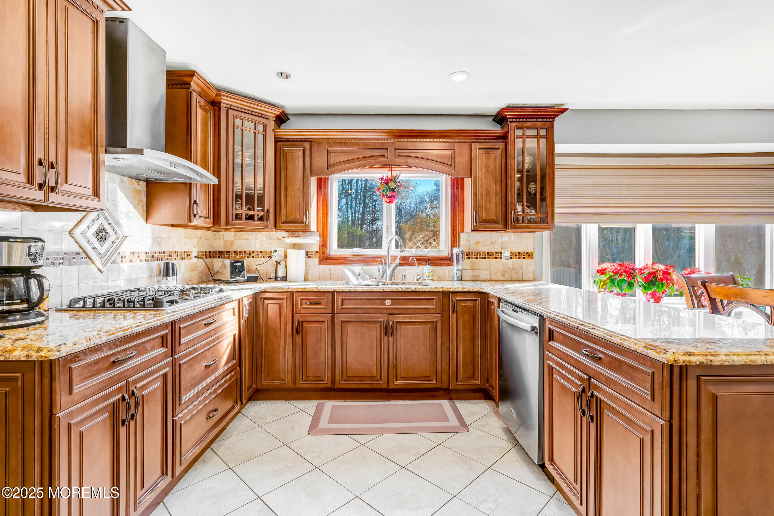 7 Oak Tree Lane Asbury Park, NJ 07712 - Photo 19 of 45 a kitchen with stainless steel appliances granite countertop a sink and a stove