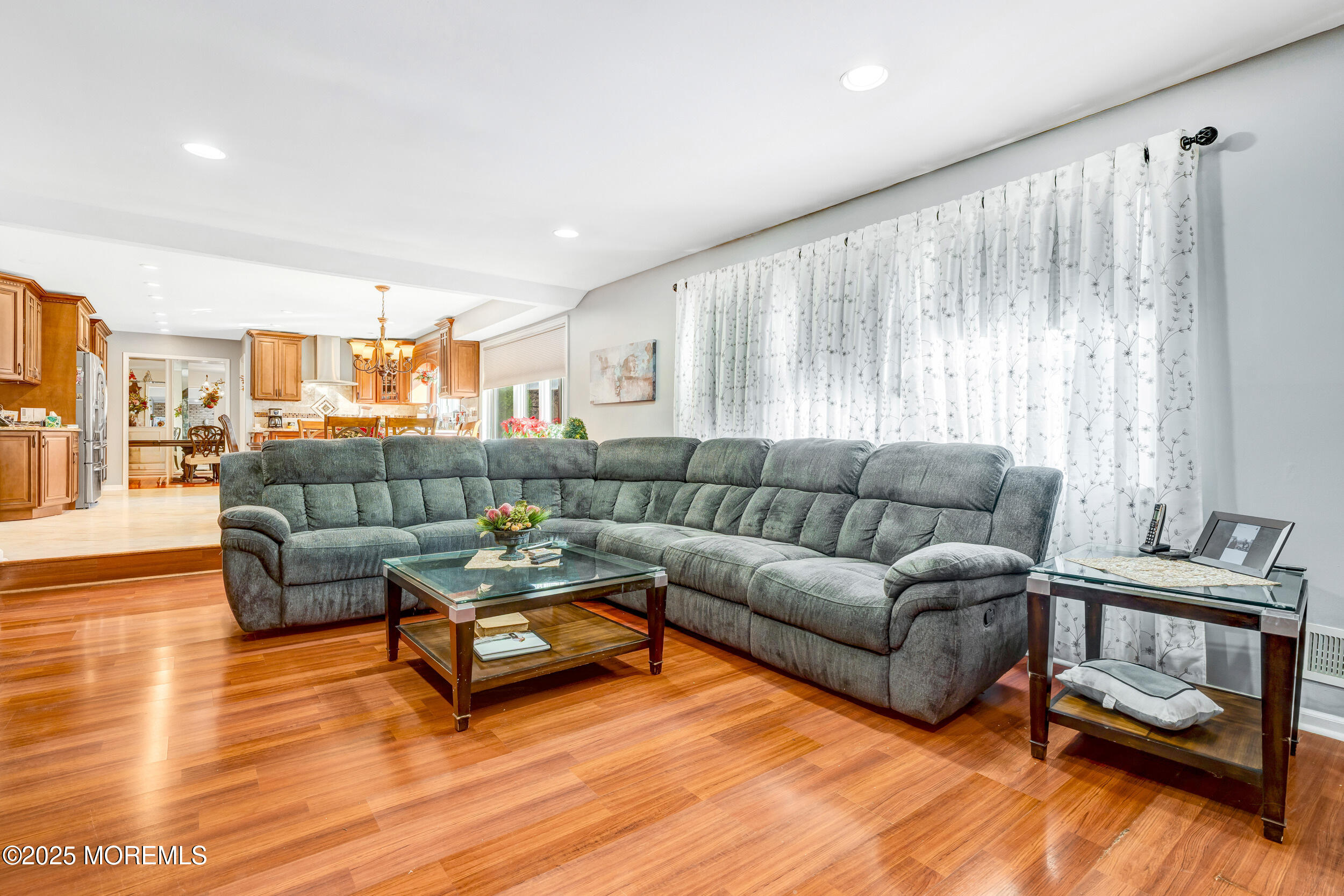 7 Oak Tree Lane Asbury Park, NJ 07712 - Photo 25 of 45 a living room with furniture and a wooden floor
