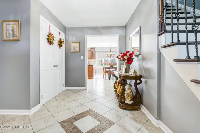 a view of a entryway with furniture and livingroom view