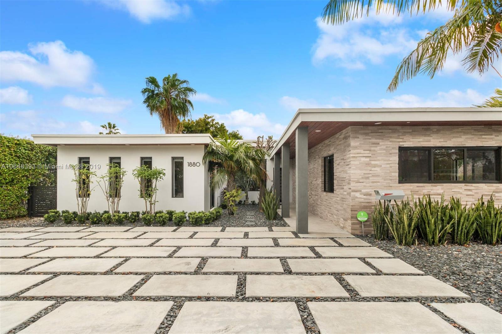 1880 Cleveland Road Miami Beach, FL 33141 - Photo 17 of 26 a front view of house with a garden