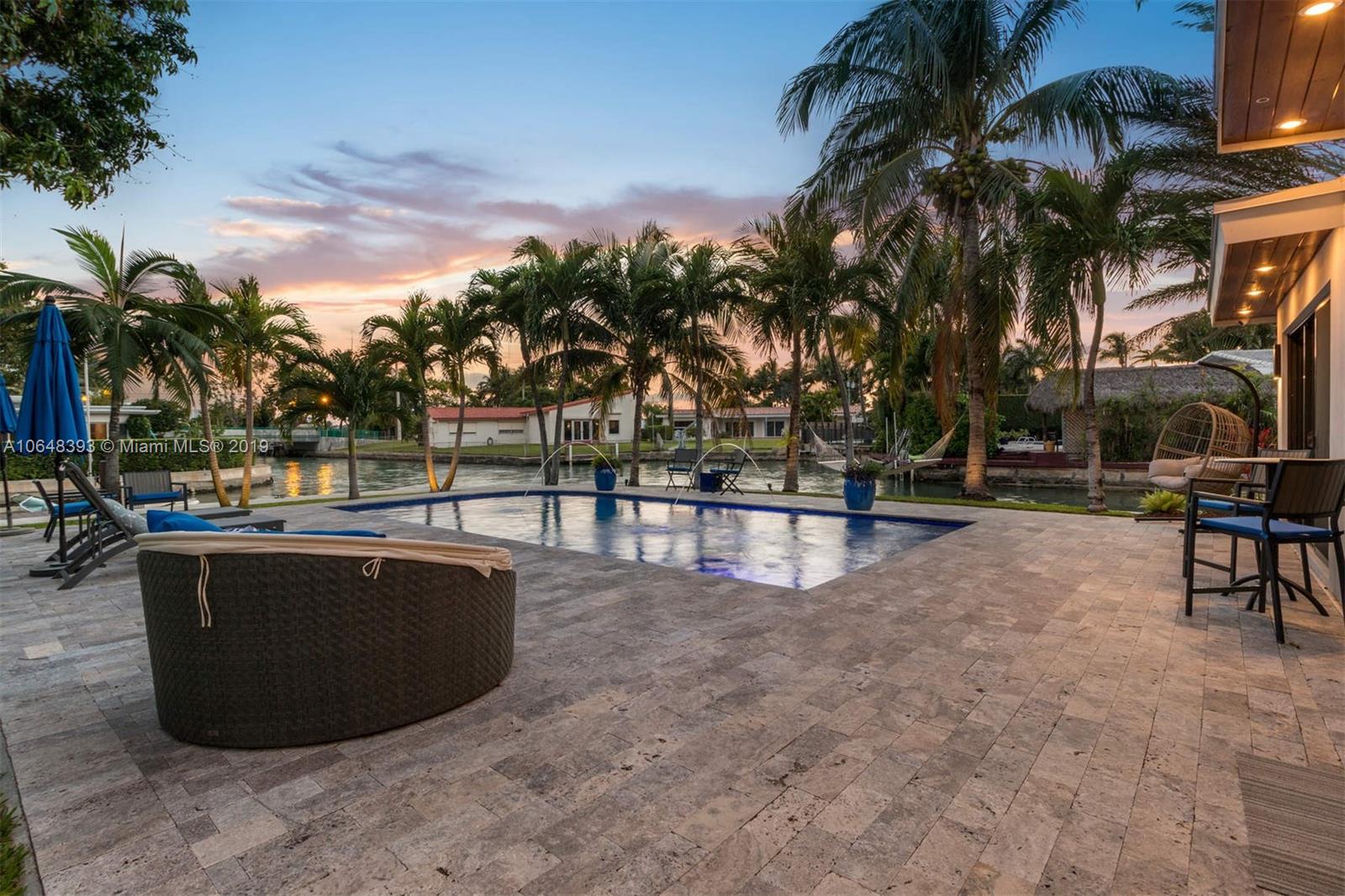 1880 Cleveland Road Miami Beach, FL 33141 - Photo 21 of 26 a view of outdoor space with swimming pool and sitting area
