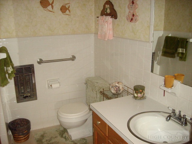 2195 Deerfield Road Boone, NC 28607 - Photo 3 of 19 a bathroom with a sink and a toilet
