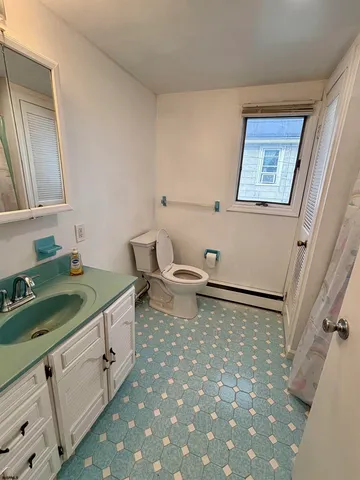 a view of balcony with wooden floor