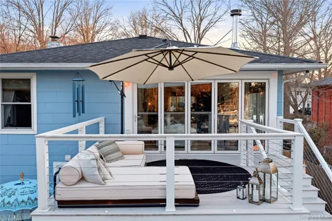 a view of a terrace with furniture