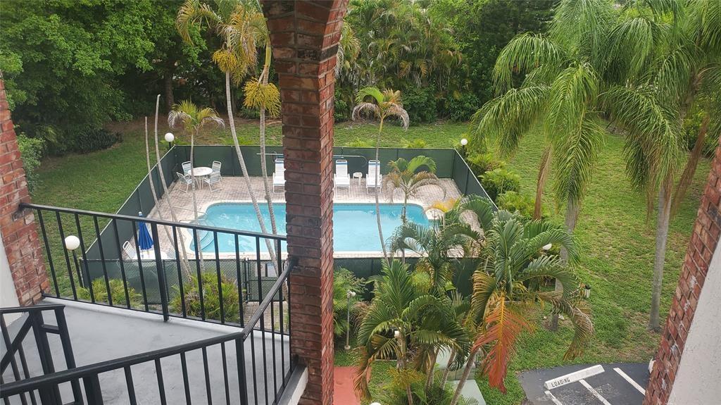 3910 Crystal Lake Drive, Unit 403 Deerfield Beach, FL 33064 - Photo 12 of 27 a view of a balcony