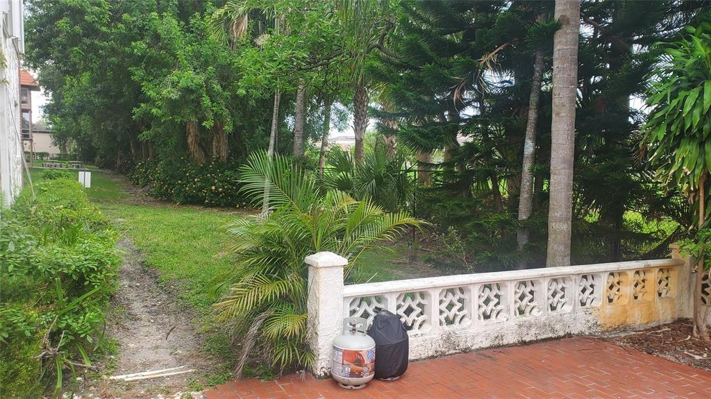 3910 Crystal Lake Drive, Unit 403 Deerfield Beach, FL 33064 - Photo 6 of 27 a view of statue in a garden