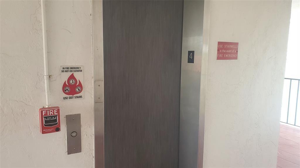 3910 Crystal Lake Drive, Unit 403 Deerfield Beach, FL 33064 - Photo 9 of 27 a sign that is on a refrigerator