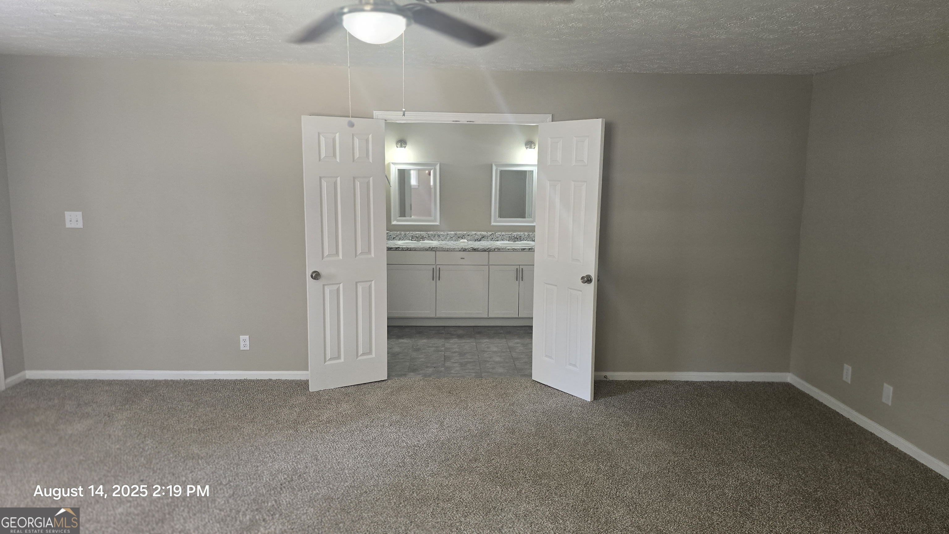 601 Youngs Mill Road Americus, GA 31719 - Photo 16 of 39 an empty room with mirror and entrance