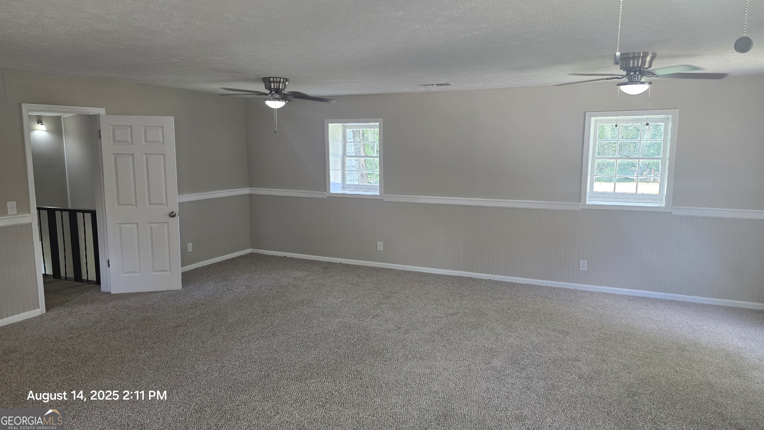 601 Youngs Mill Road Americus, GA 31719 - Photo 18 of 39 an empty room with windows and closet