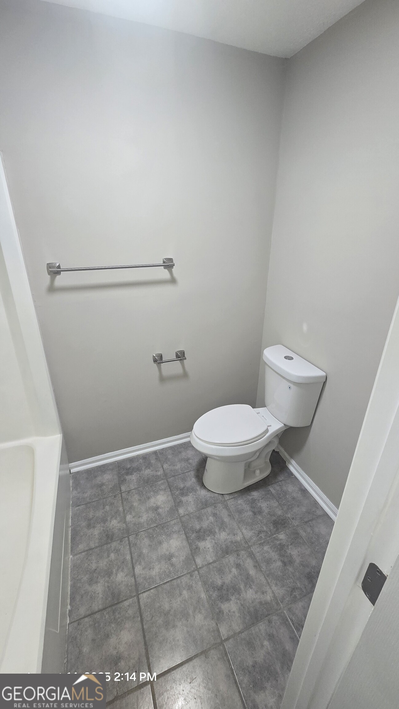 601 Youngs Mill Road Americus, GA 31719 - Photo 24 of 39 a bathroom with a toilet and a rug