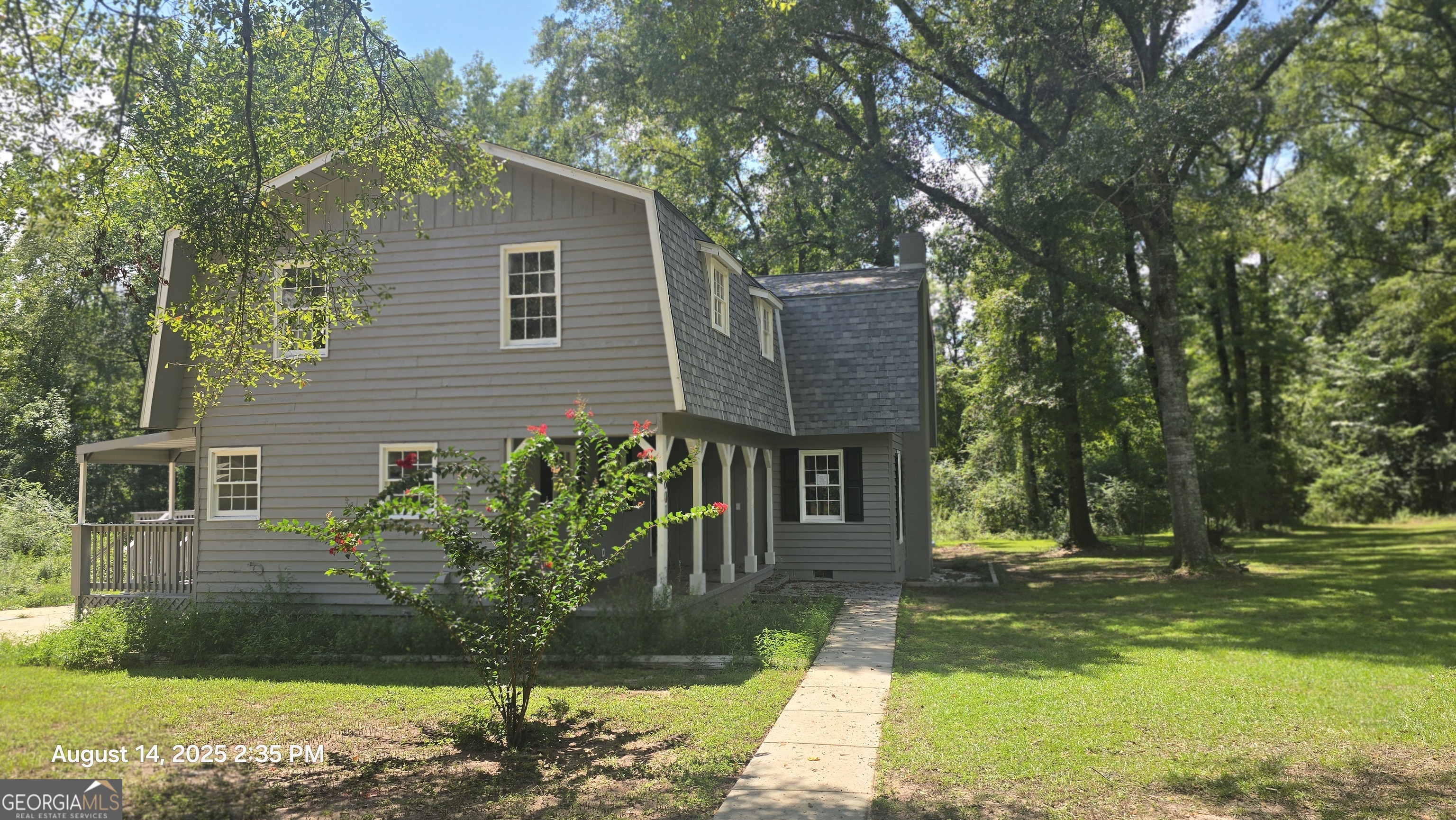 601 Youngs Mill Road Americus, GA 31719 - Photo 35 of 39 a front view of a house with garden