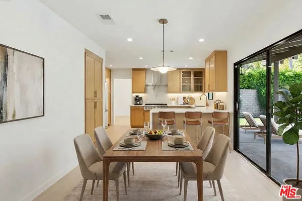 an empty room with windows and yard