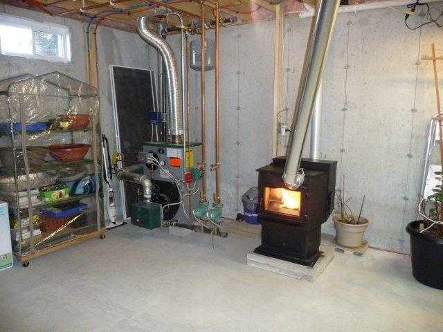 16 Parker Ridge Road Biddeford, ME 04005 - Photo 30 of 35 Other. Furnace and Pellet Stove