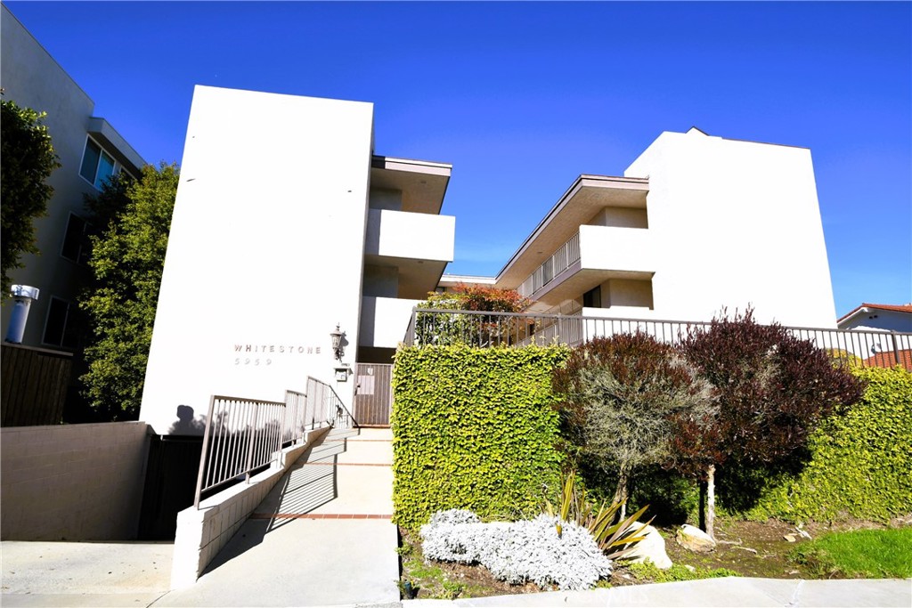 5959 Peacock Ridge Road, Unit 10 Rancho Palos Verdes, CA 90275 - Photo 1 of 1 a front view of a house with outdoor
