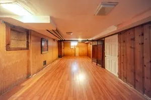 a view of hallway with wooden floor