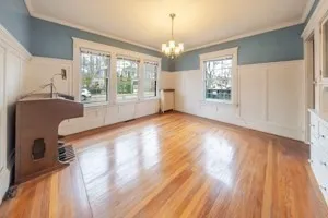 a view of livingroom with furniture wooden floor and windows