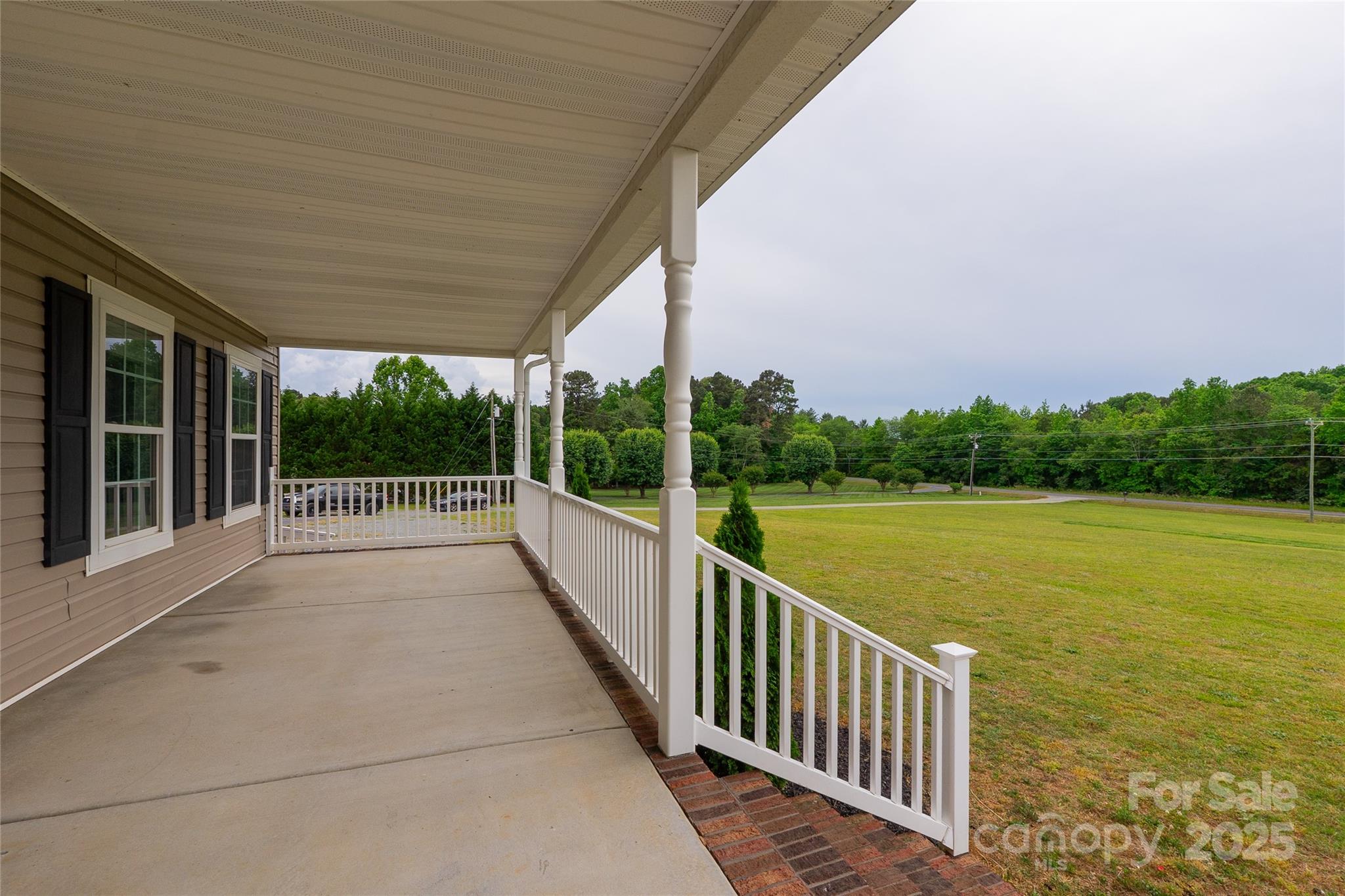 7740 Freeze Road Kannapolis, NC 28081 - Photo 11 of 43 a view of a balcony with lake view and mountain view