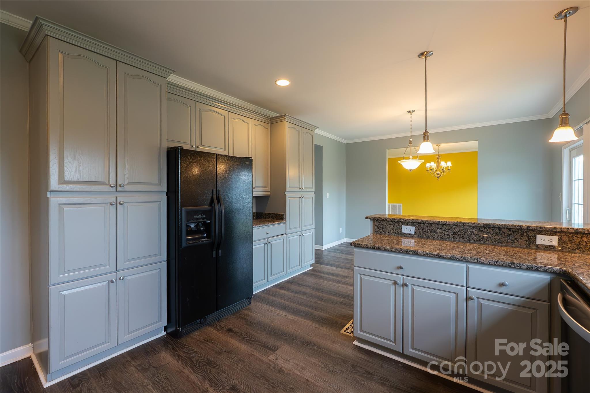 7740 Freeze Road Kannapolis, NC 28081 - Photo 18 of 43 a kitchen with stainless steel appliances granite countertop a refrigerator and a stove top oven