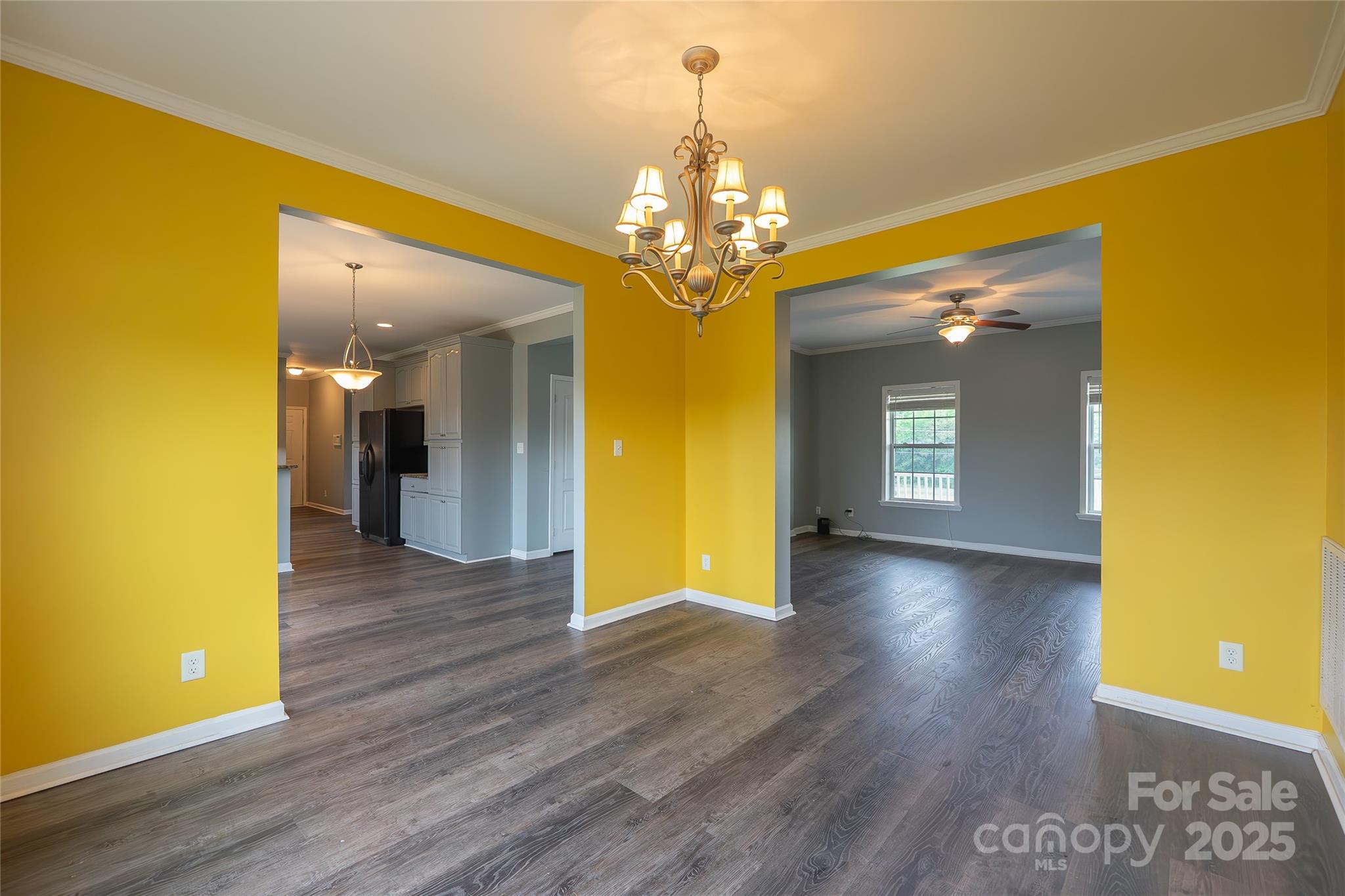 7740 Freeze Road Kannapolis, NC 28081 - Photo 19 of 43 a view of a hallway with wooden floor