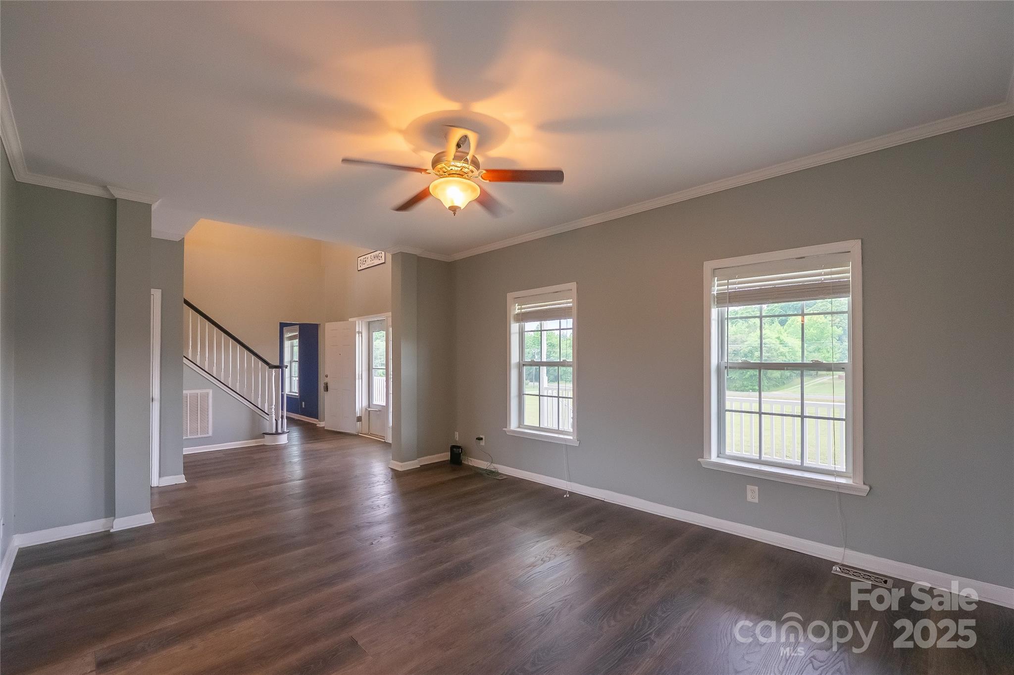 7740 Freeze Road Kannapolis, NC 28081 - Photo 20 of 43 a view of an empty room with a window and wooden floor