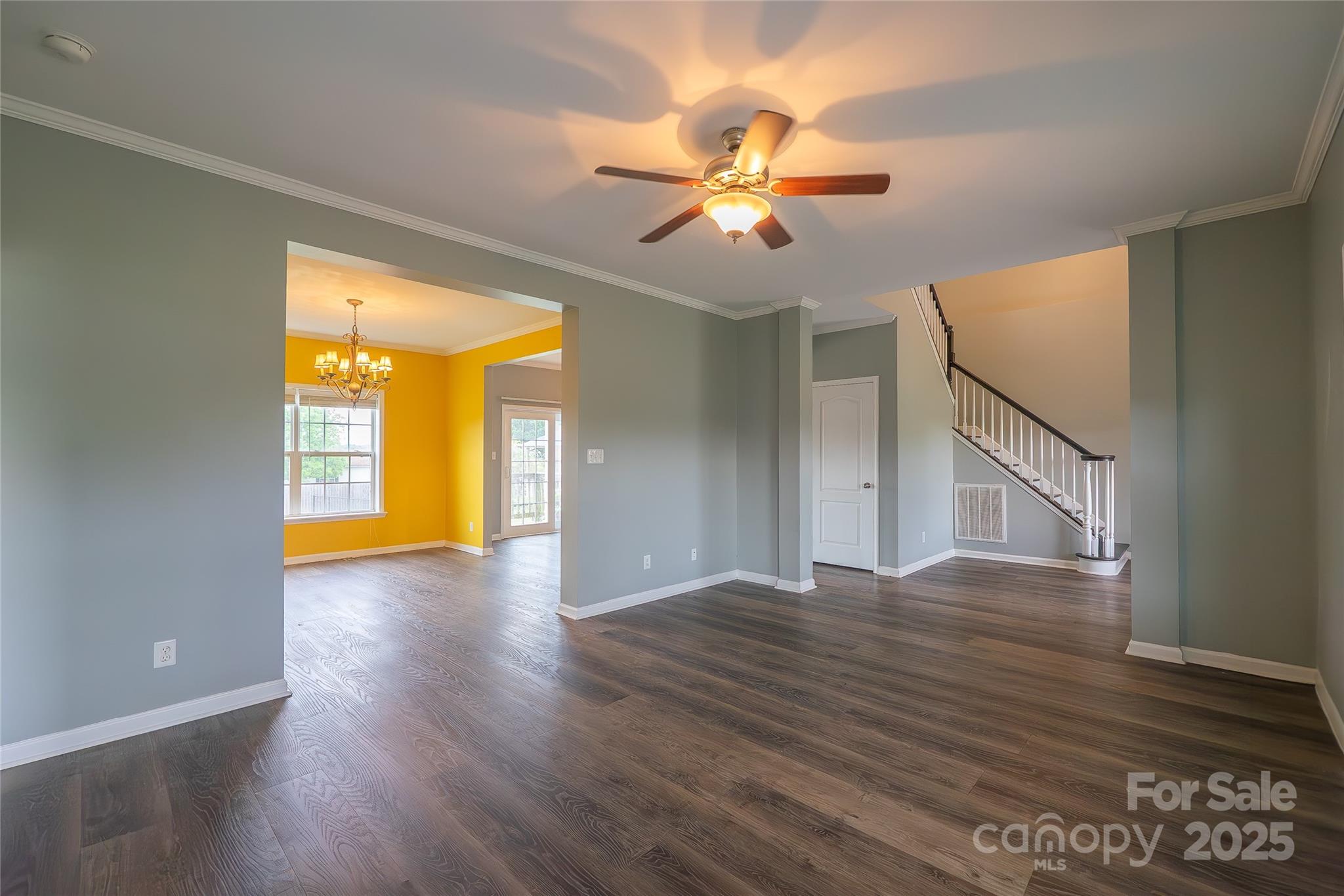 7740 Freeze Road Kannapolis, NC 28081 - Photo 21 of 43 a view of an empty room with window and wooden floor