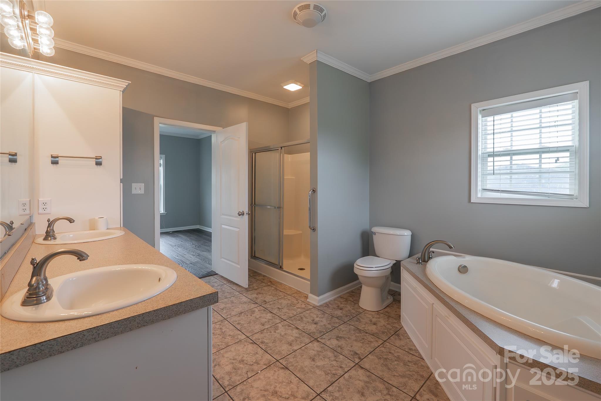7740 Freeze Road Kannapolis, NC 28081 - Photo 25 of 43 a bathroom with a sink and a bathtub