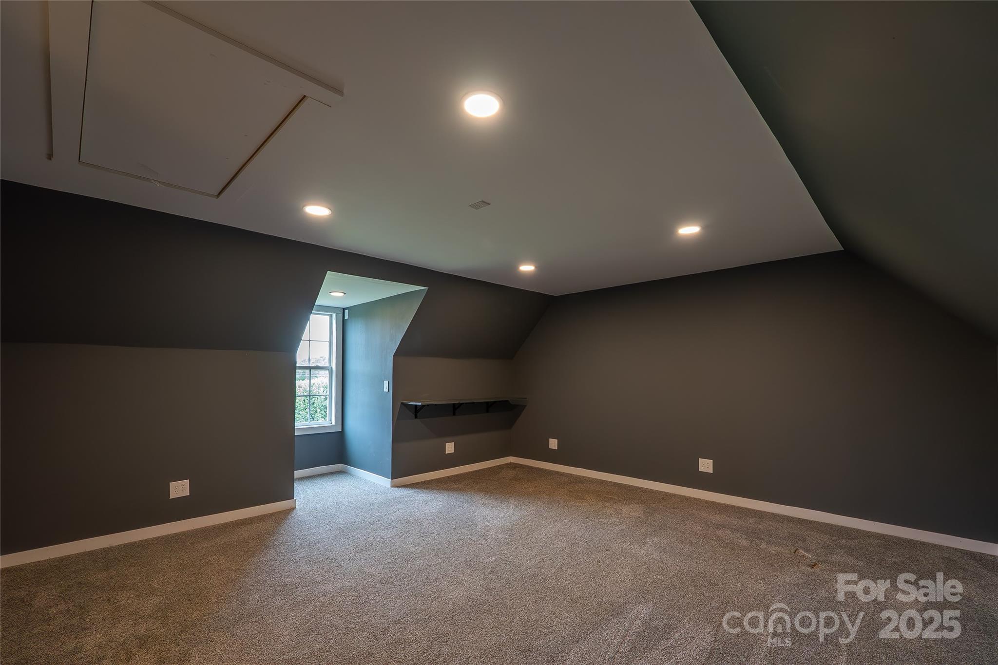 7740 Freeze Road Kannapolis, NC 28081 - Photo 32 of 43 a view of an empty room with a fireplace