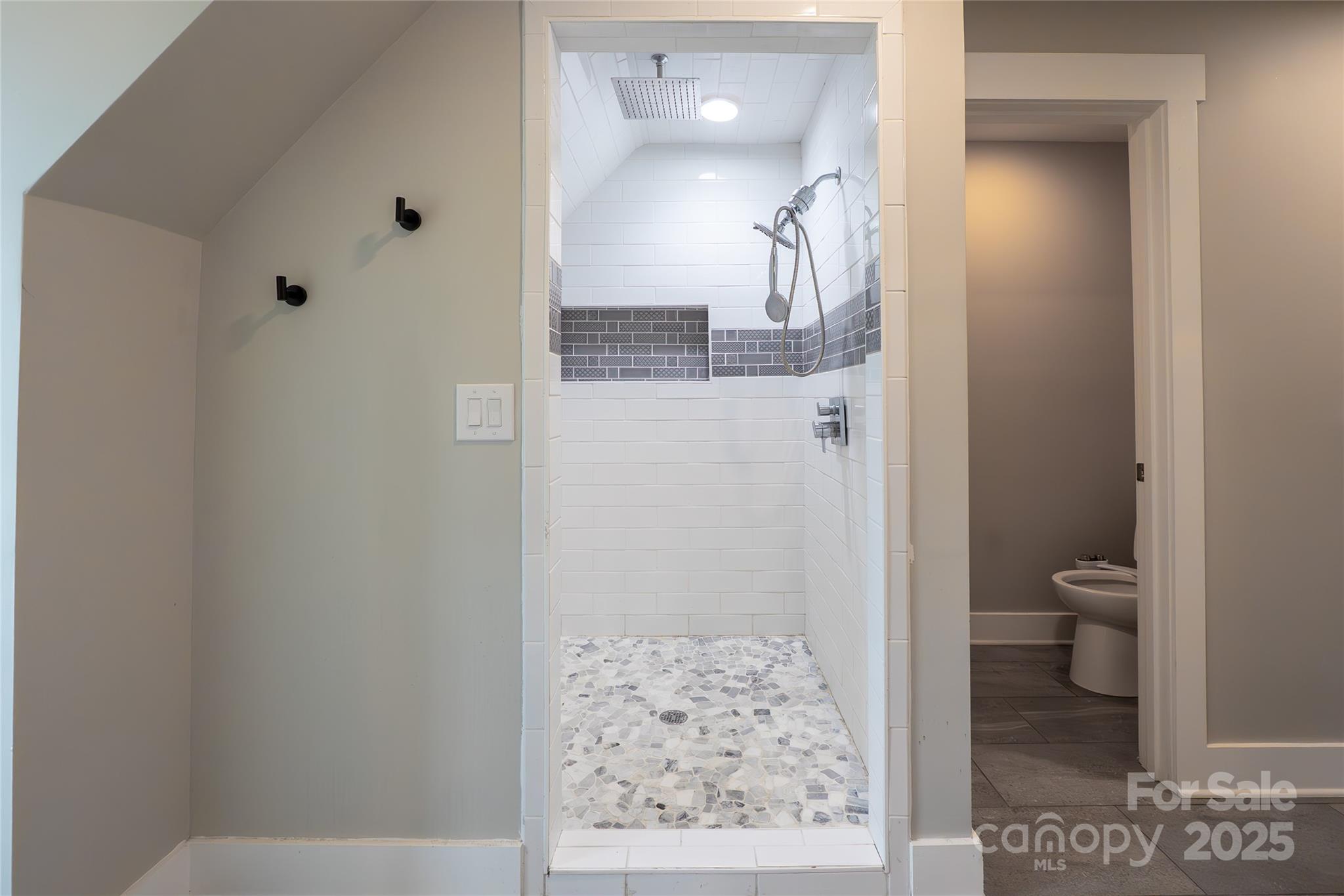 7740 Freeze Road Kannapolis, NC 28081 - Photo 40 of 43 a bathroom with a granite countertop sink a toilet and shower