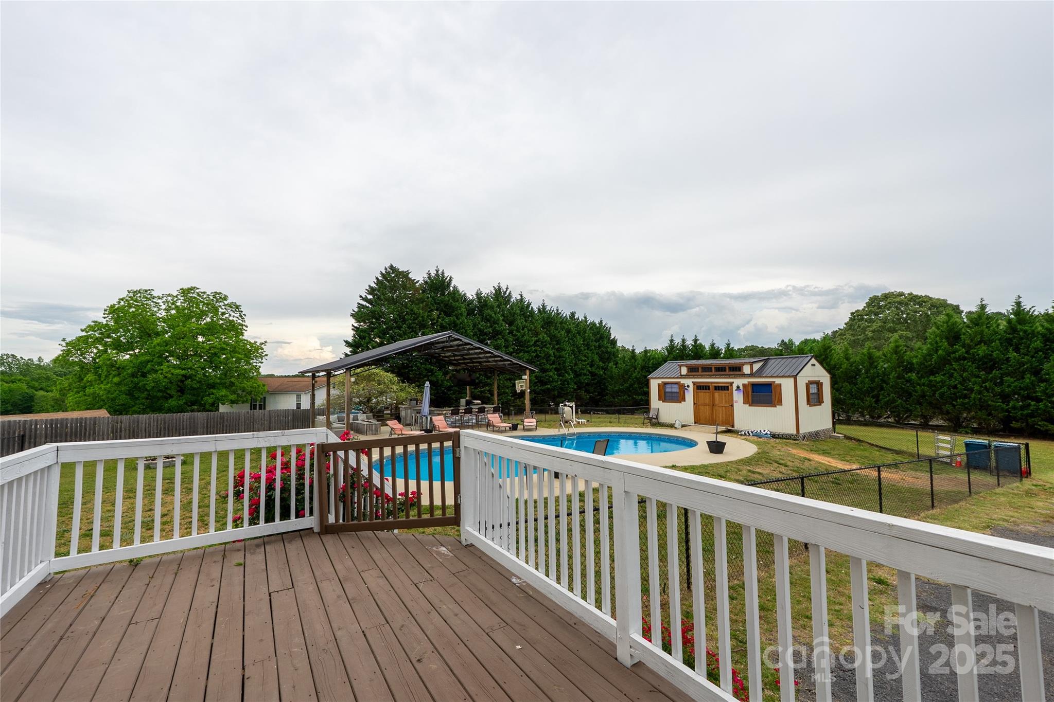 7740 Freeze Road Kannapolis, NC 28081 - Photo 43 of 43 a view of a wooden deck with a yard
