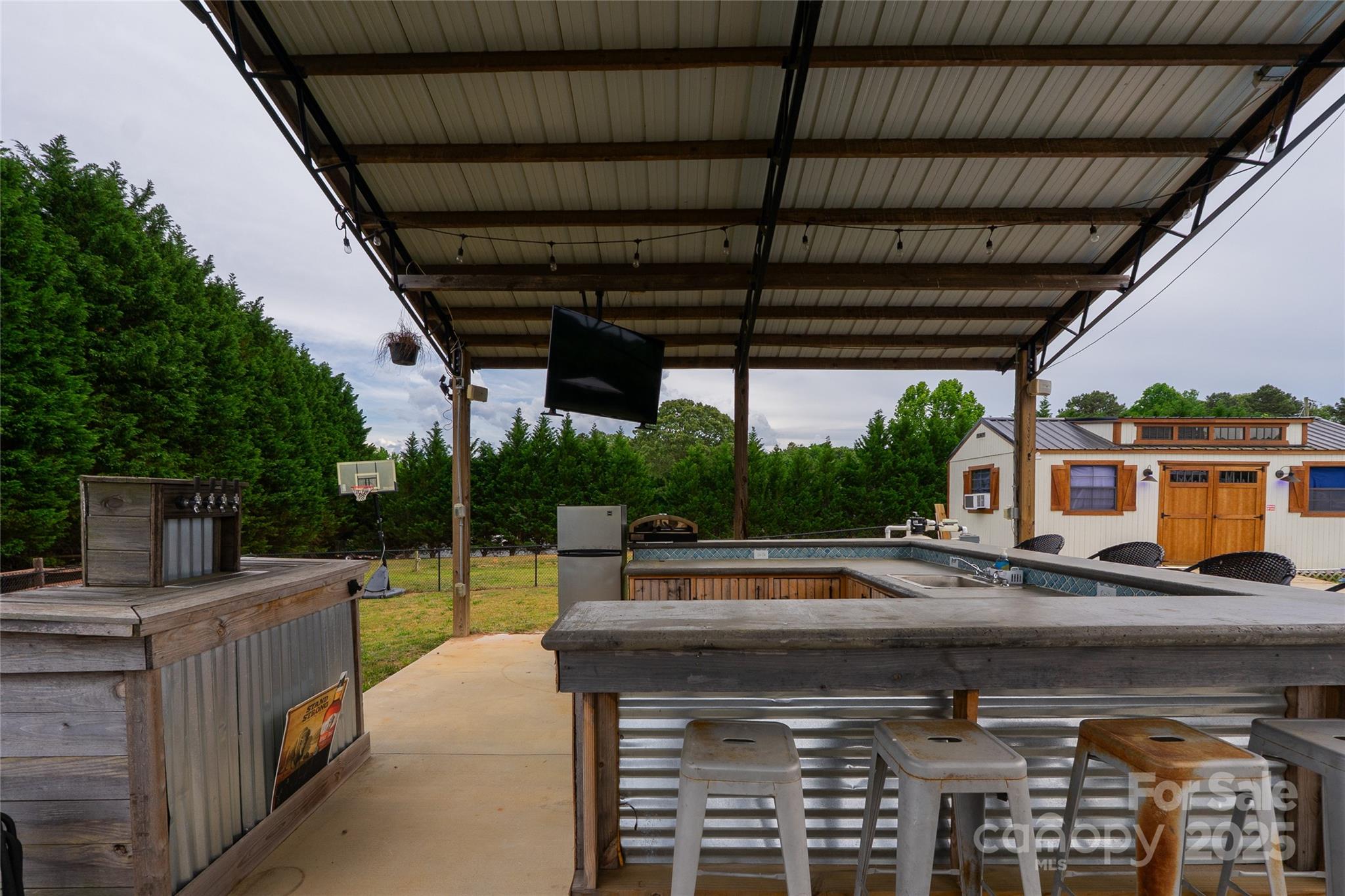 7740 Freeze Road Kannapolis, NC 28081 - Photo 5 of 43 a view of a swimming pool with a patio