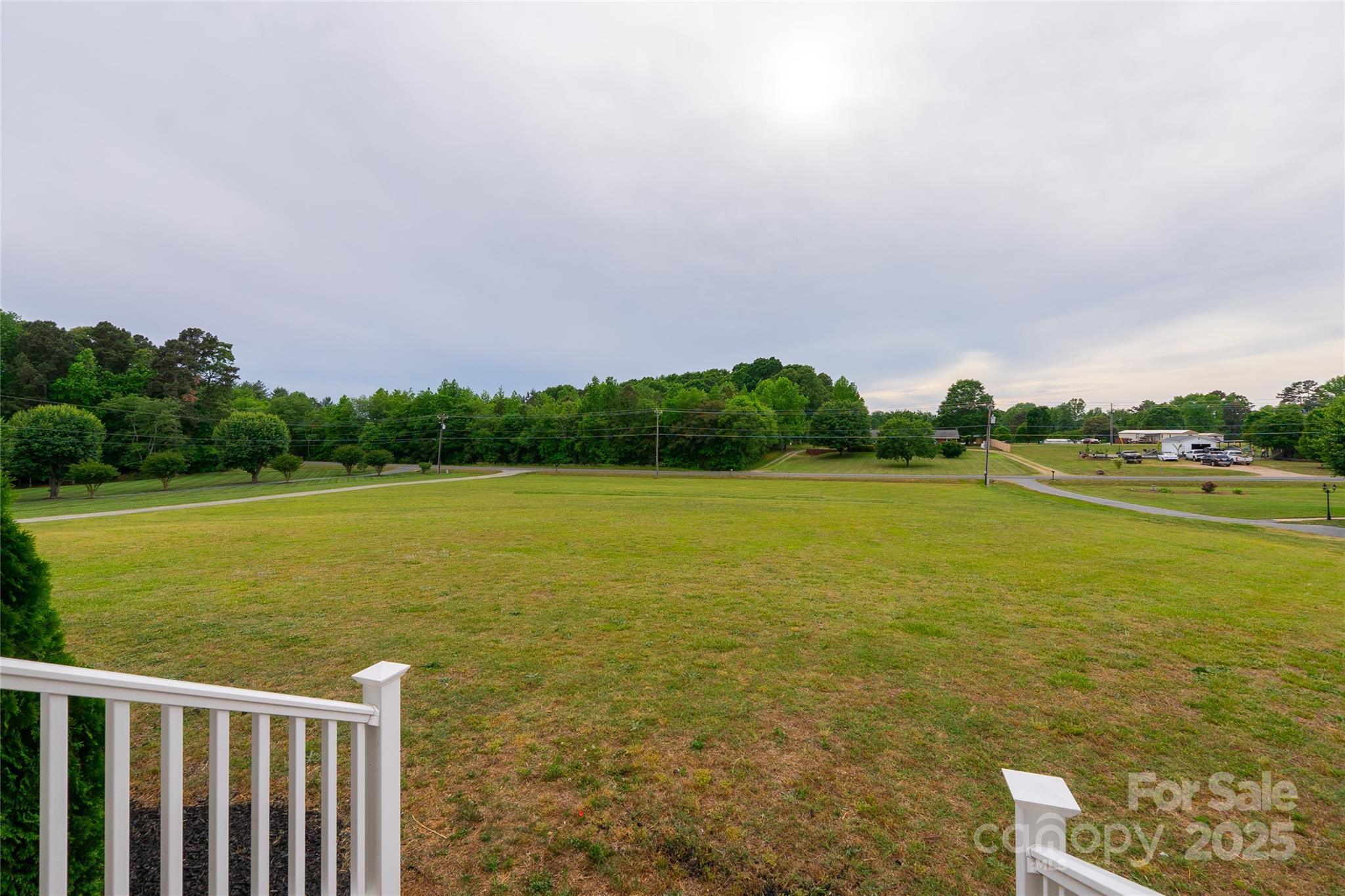 7740 Freeze Road Kannapolis, NC 28081 - Photo 10 of 43 a view of a lake with a city view