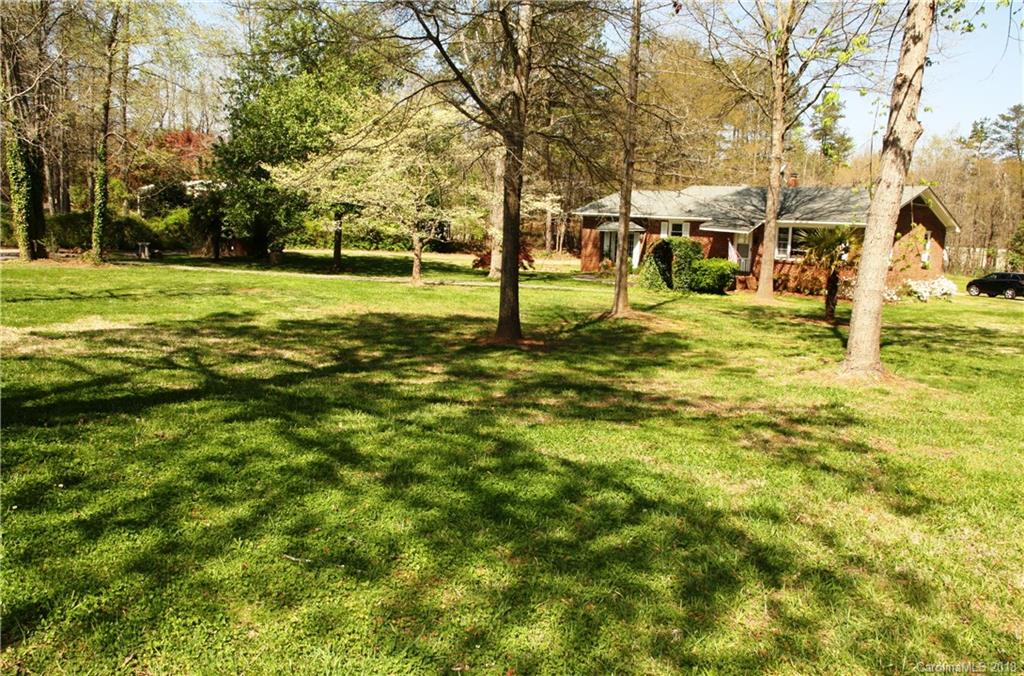 878 Sherwood Road Clover, SC 29710 - Photo 2 of 21 a view of a park with lots of trees and plants