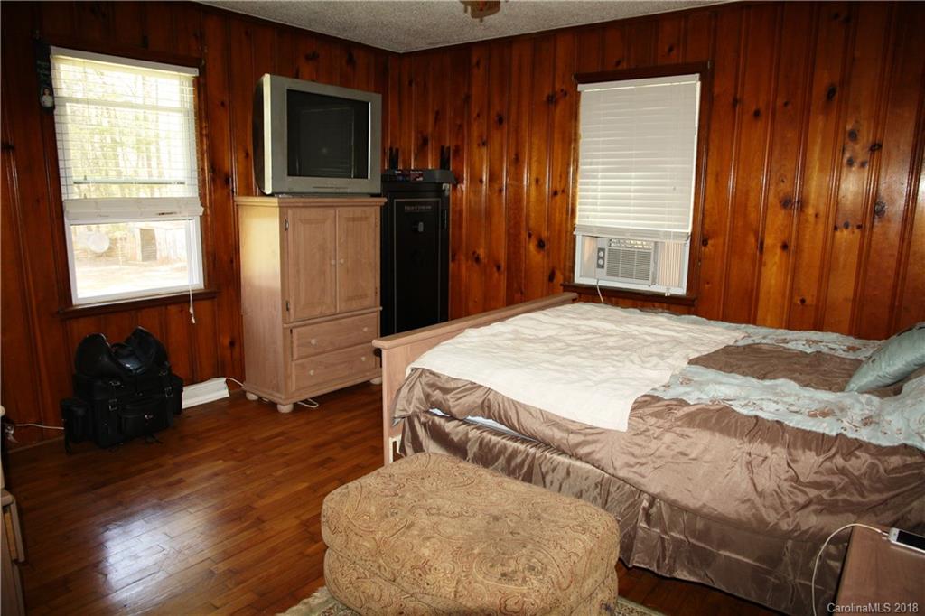 878 Sherwood Road Clover, SC 29710 - Photo 11 of 21 a bedroom with a bed and a television