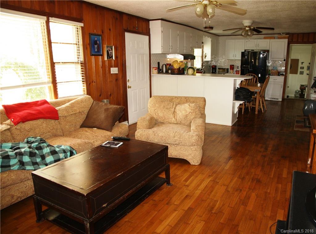 878 Sherwood Road Clover, SC 29710 - Photo 5 of 21 a living room with furniture and a flat screen tv