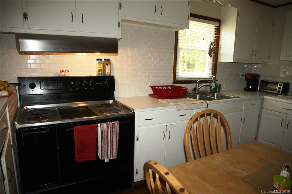 878 Sherwood Road Clover, SC 29710 - Photo 7 of 21 a kitchen with stainless steel appliances a stove a sink and a microwave