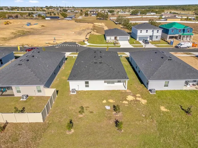 a view of a city with an ocean view