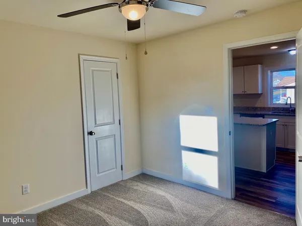 a view of livingroom and hardwood floor