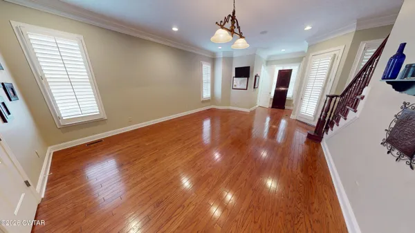 a kitchen with a sink and a refrigerator