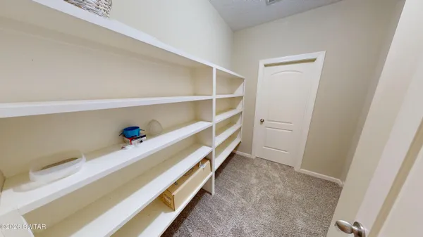 a view of a house with a snow