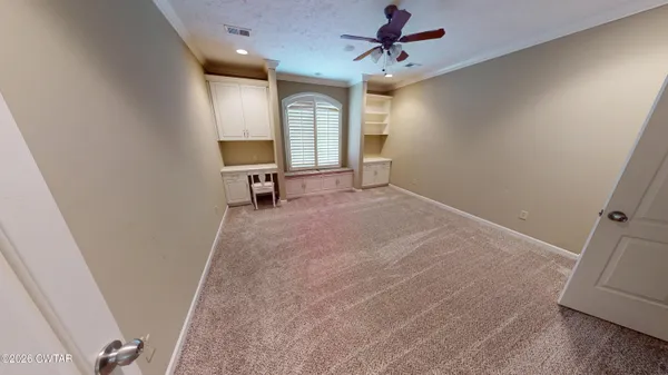 an aerial view of a house with entertaining space