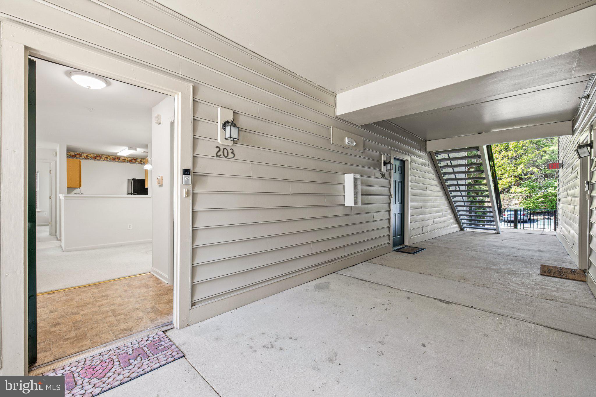 1049 Gardenview Loop, Unit 203 Woodbridge, VA 22191 - Photo 3 of 25 a view of front door of house