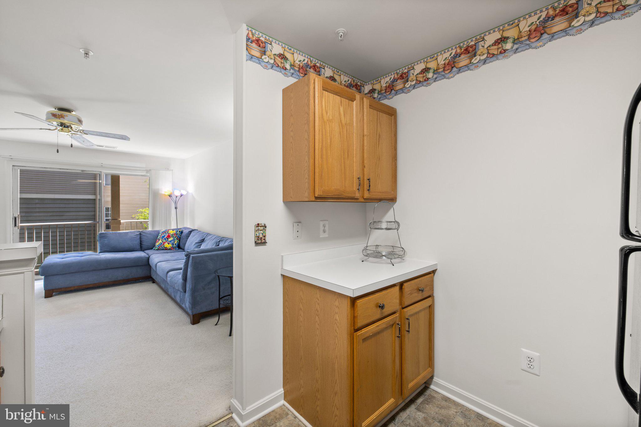1049 Gardenview Loop, Unit 203 Woodbridge, VA 22191 - Photo 10 of 25 a bathroom with a sink a mirror and shower