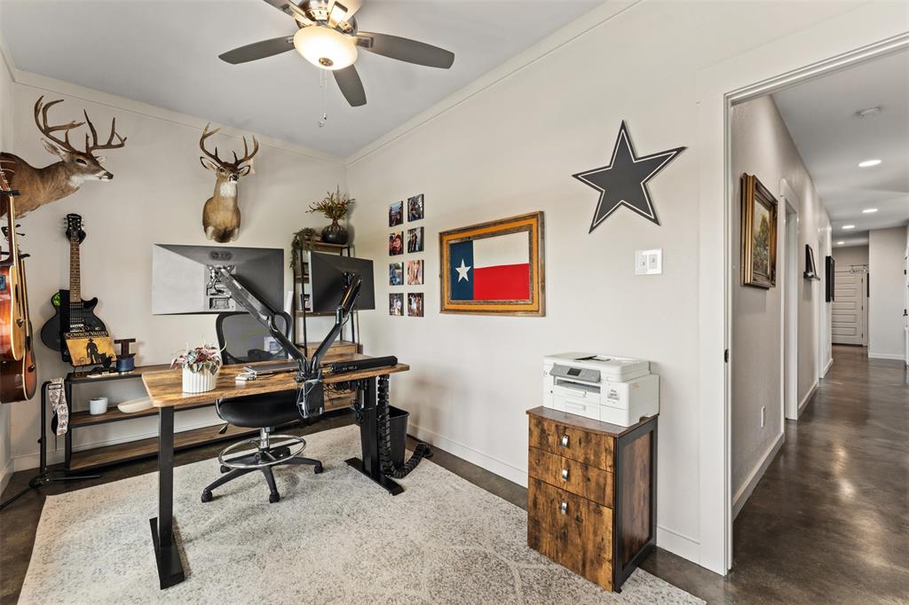 124 Bluffview Circle China Spring, TX 76633 - Photo 20 of 40 Dedicated room featuring a ceiling fan, light-toned walls, and a light-colored area rug