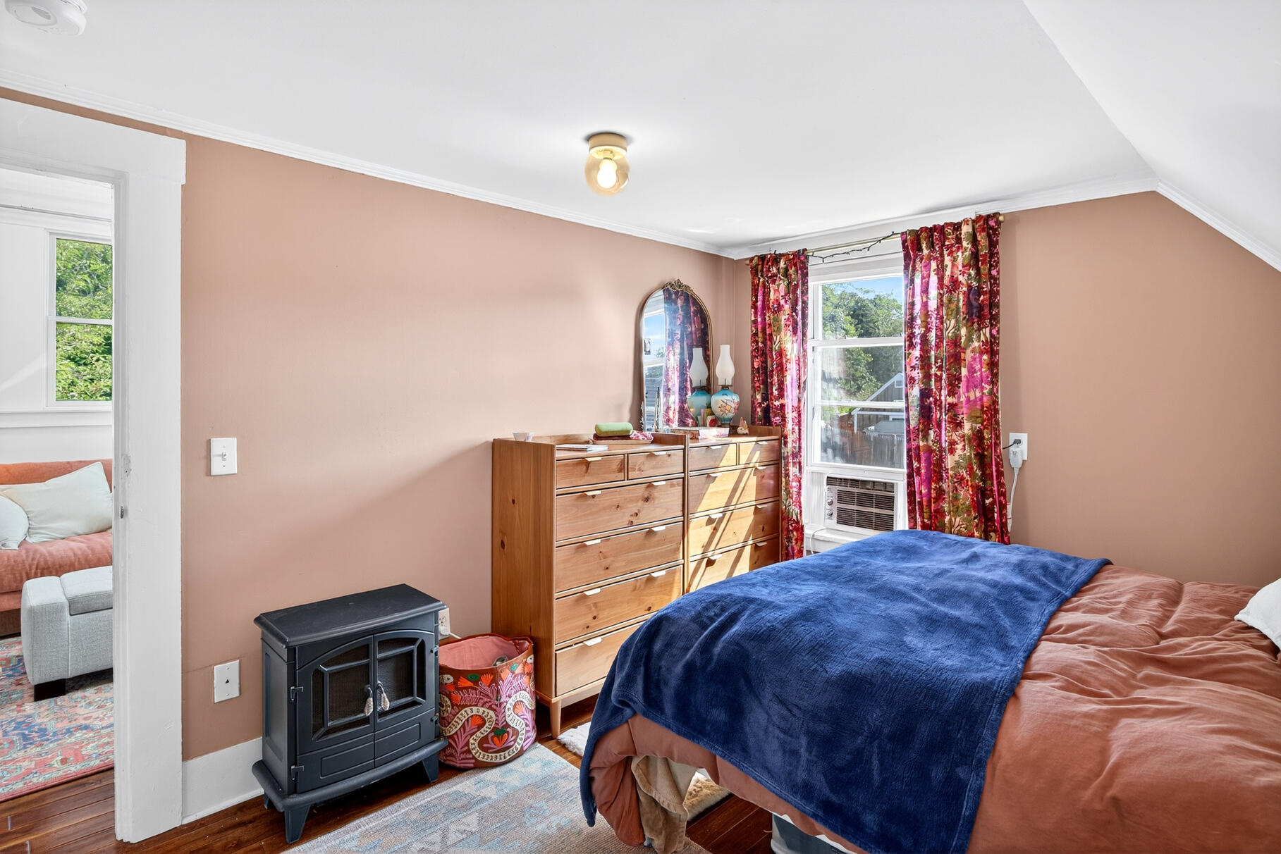 4 Highland Road, Unit C Truro, MA 02666 - Photo 15 of 21 a bed room with a bed and a tv