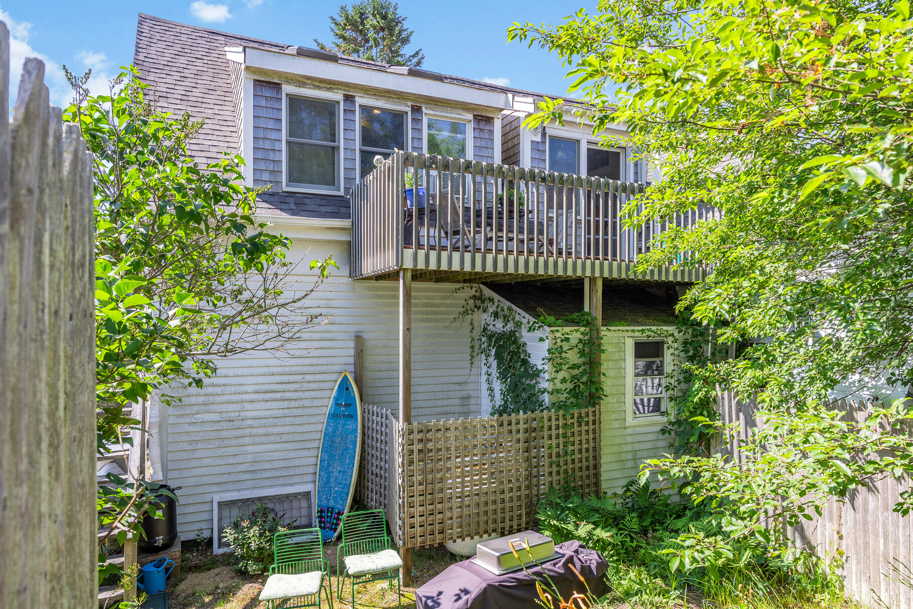 4 Highland Road, Unit C Truro, MA 02666 - Photo 18 of 21 a view of a deck with a house