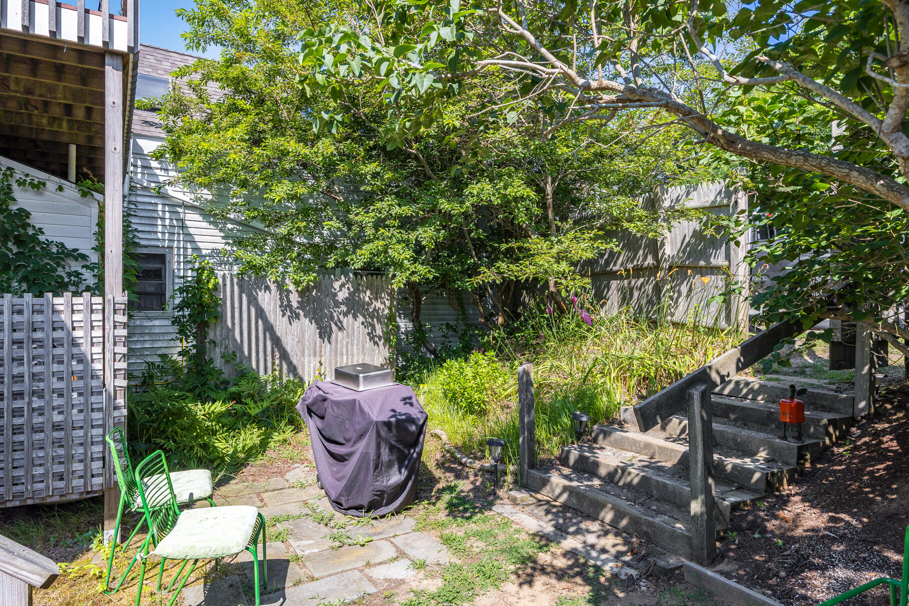 4 Highland Road, Unit C Truro, MA 02666 - Photo 19 of 21 a backyard of a house with lots of green space
