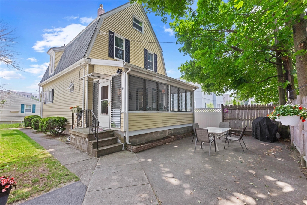 8 A 3rd Street Medford, MA 02155 - Photo 1 of 24 a view of a house with backyard and sitting area
