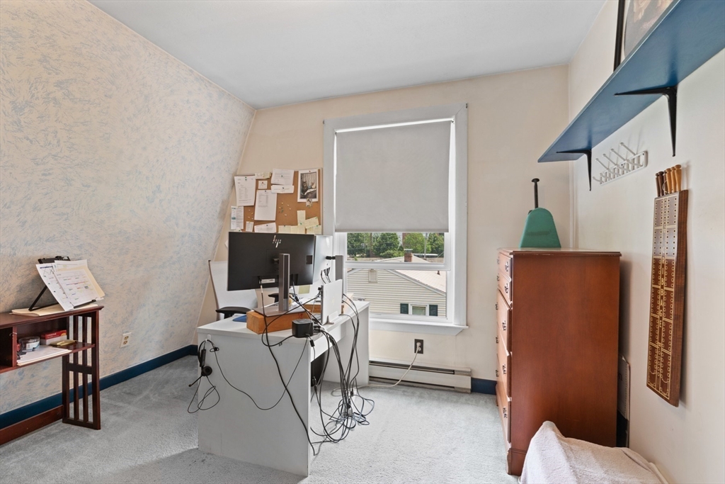 8 A 3rd Street Medford, MA 02155 - Photo 19 of 24 a view of a workspace with furniture and a window