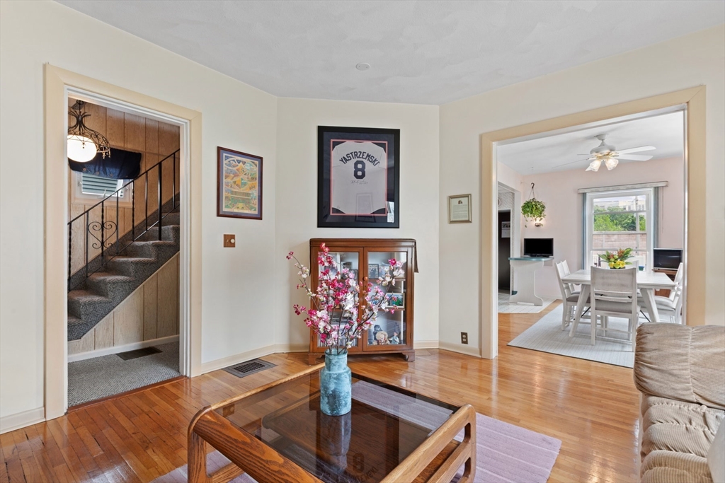 8 A 3rd Street Medford, MA 02155 - Photo 6 of 24 a view of a livingroom with furniture and window